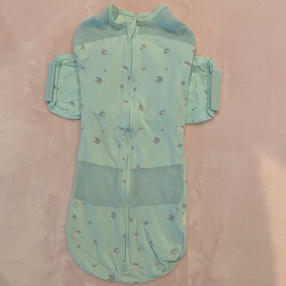 Near new pale green Happiest Baby swaddle for SNOO.